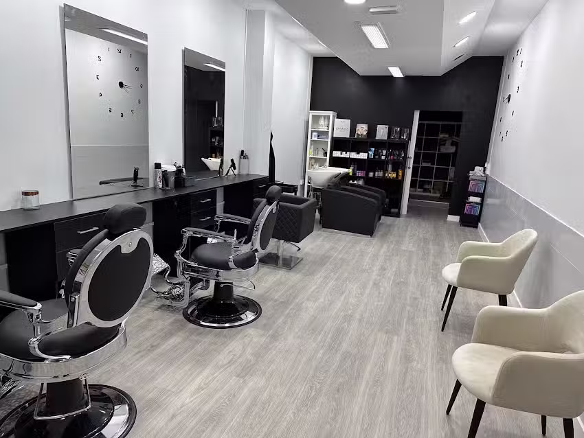 Almaraz Peluquer&iacute;a & Barberia