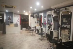 Perruqueria i Barbería Tali’s.
