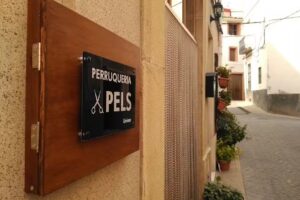 Perruqueria Pels Unisex